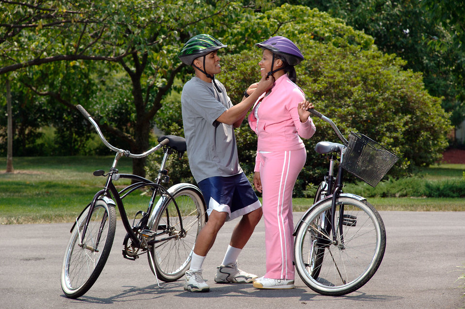 A middle-aged couple on a bike ride keeping their fitness