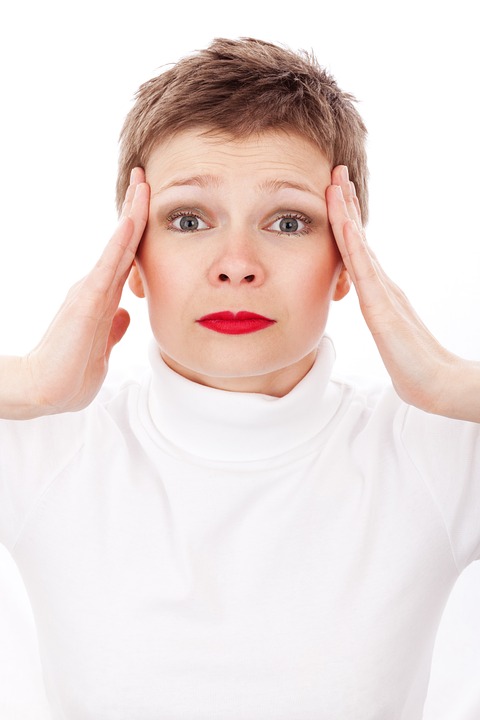 Stressed Women At Her Desk Making it difficult to Lose Weight